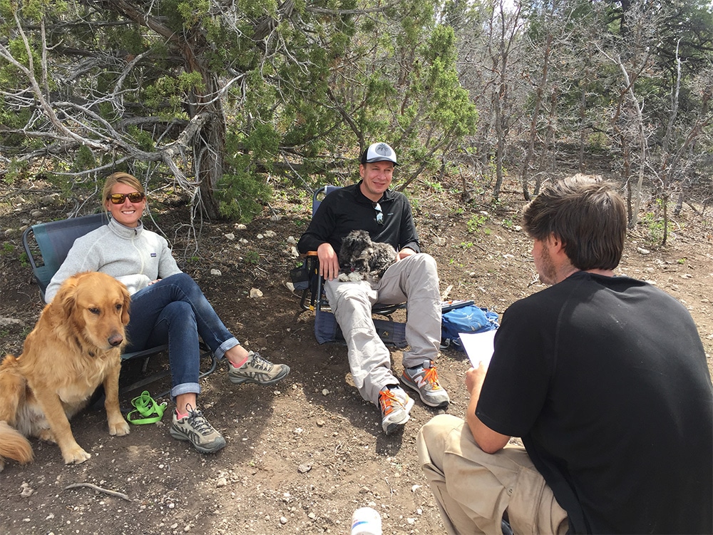 Therapists meet with at student while attending Aspiro Wilderness Adventure Therapy program